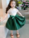 Adorable girl wearing a white Summer Bloom Lace Trim Dress showcasing its delicate lace details and summery style