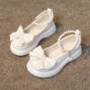 Adorable Princess Bow  Pearl Girls Mary Janes in white perfect for weddings parties and casual wear