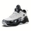 Stylish and comfortable Rebellious Splatter Paint Shoes from Newness Durable breathable sneakers with a trendy splatter paint design perfect for young trendsetters