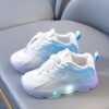 Kids BananaDeer Galaxy Glow LED Sneakers lighting up with vibrant colors