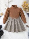 Adorable Newness toddler girl set featuring a cozy knit top and a chic houndstooth skirt perfect for fall and winter