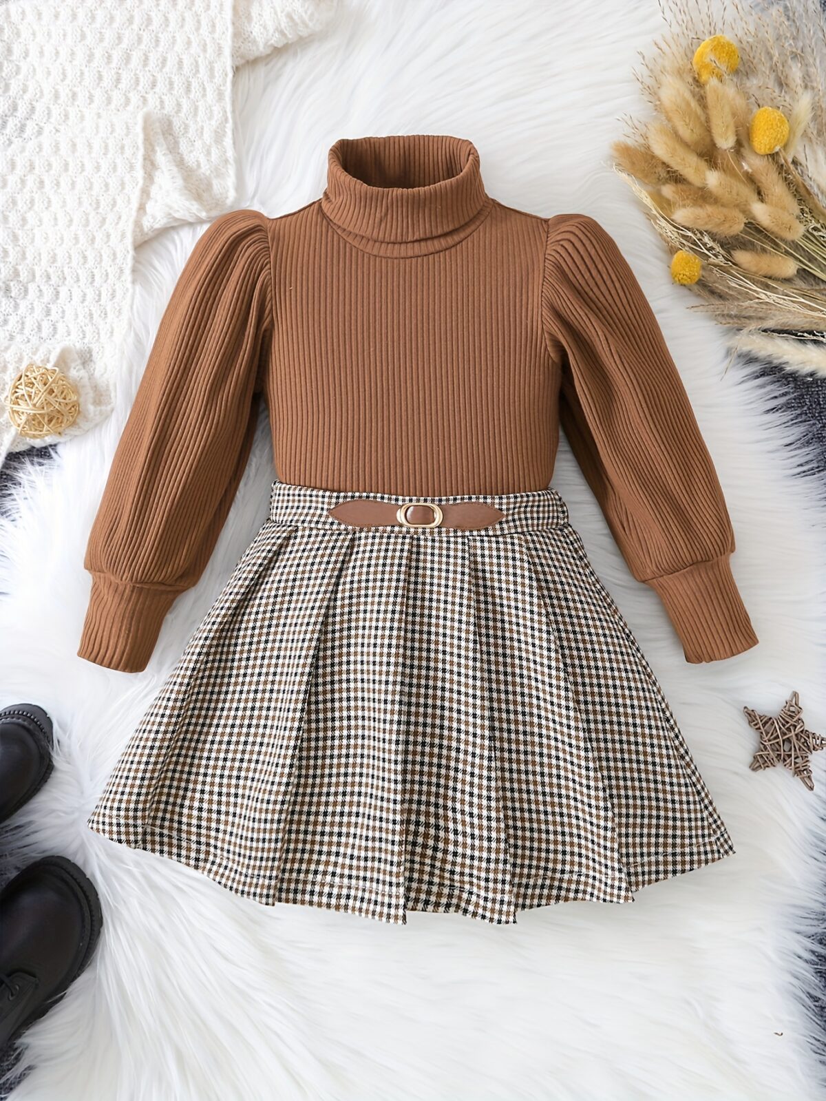 Adorable Newness toddler girl set featuring a cozy knit top and a chic houndstooth skirt perfect for fall and winter