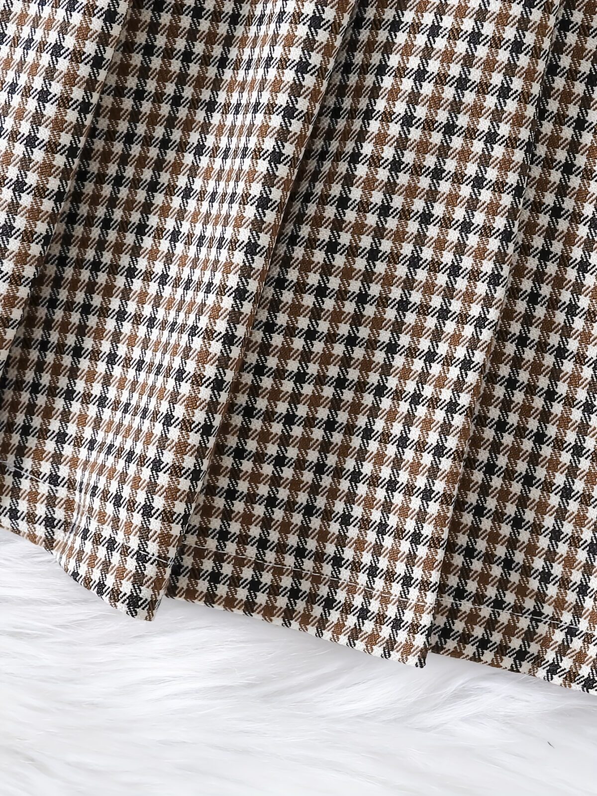 Adorable Newness toddler girl set featuring a cozy knit top and a chic houndstooth skirt perfect for fall and winter