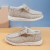 Stylish and comfortable Newness kids canvas loafers perfect for summer adventures Image shows childrens feet wearing the loafers