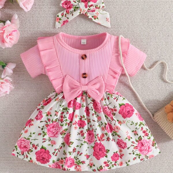Adorable baby girl wearing a Summer Bloom floral dress perfect for summer