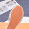 A pair of elegant Starlight Sparkle Girls Princess Heels perfect for weddings and special events The shoes feature sparkling embellishments and a delicate design