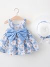 Baby girl wearing adorable Newness Sunny Days floral print dress