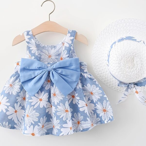Baby girl wearing adorable Newness Sunny Days floral print dress