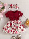 Adorable baby girl wearing a Summer Bloom floral dress perfect for summer