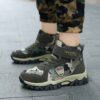 Stylish and durable Newness Explorer Kids Camo Boots perfect for outdoor adventures Showcasing their camouflage pattern and sturdy construction