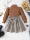 Adorable Newness toddler girl set featuring a cozy knit top and a chic houndstooth skirt perfect for fall and winter