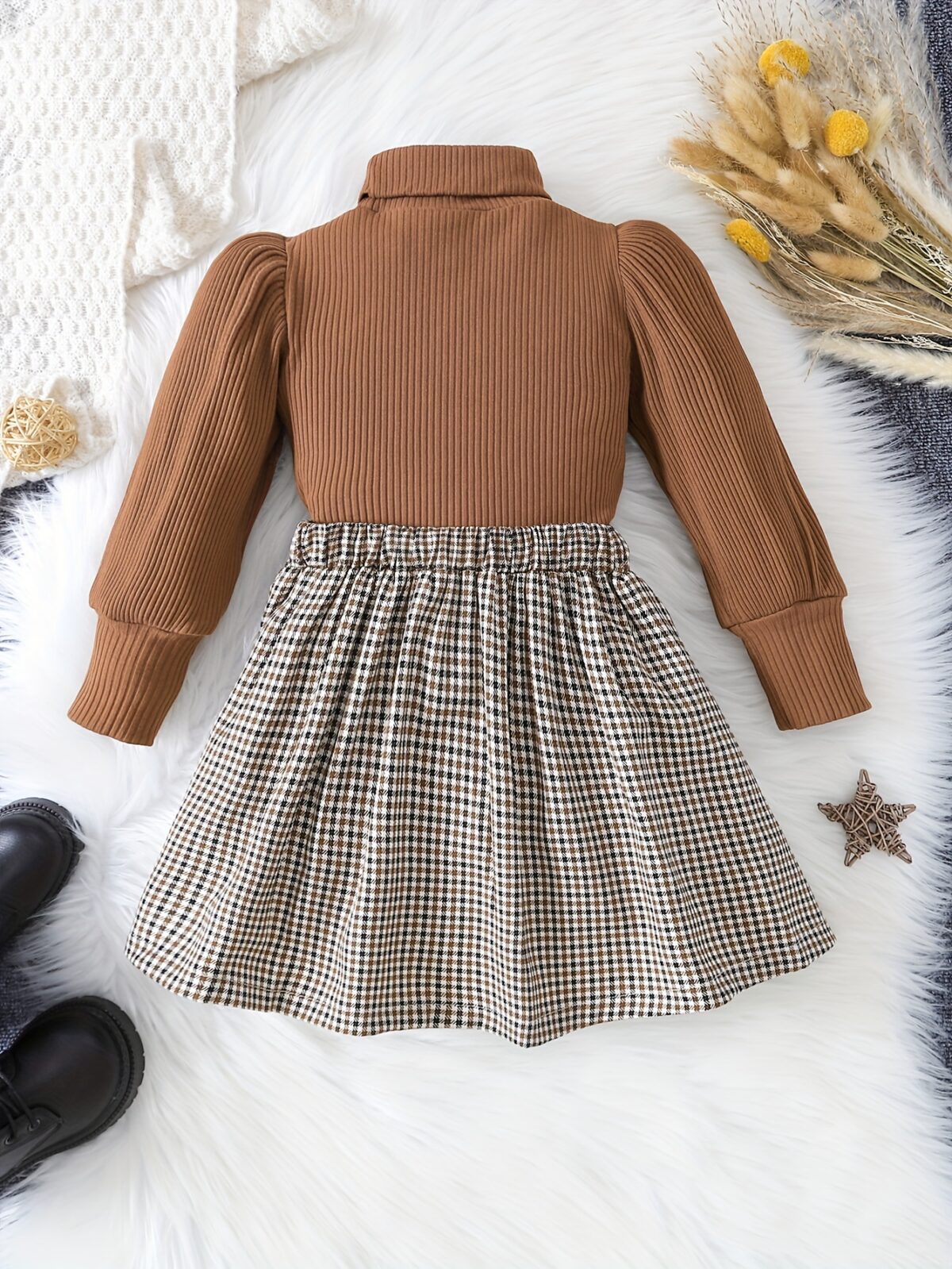 Adorable Newness toddler girl set featuring a cozy knit top and a chic houndstooth skirt perfect for fall and winter
