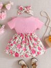 Adorable baby girl wearing a Summer Bloom floral dress perfect for summer