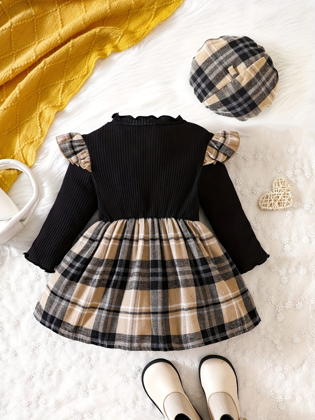 Adorable baby girl wearing a darling plaid skirt set and beret Perfect spring or fall outfit