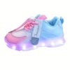 Kids GUANGLAN Nova Glow Shoes lighting up at night showcasing their lightweight and durable design Perfect for nighttime play and adventures