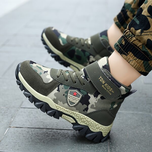 Stylish and durable Newness Explorer Kids Camo Boots perfect for outdoor adventures Showcasing their camouflage pattern and sturdy construction