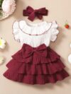 Adorable toddler girl in a vibrant Summer Bloom dress perfect for summer adventures The dress features a playful floral print and comfortable breathable fabric