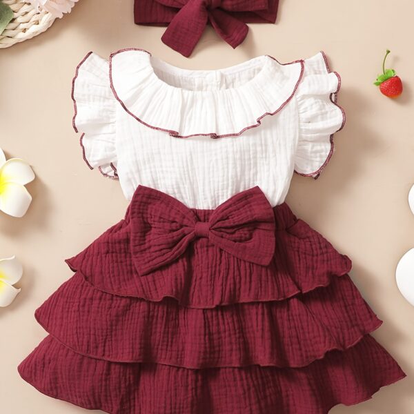 Adorable toddler girl in a vibrant Summer Bloom dress perfect for summer adventures The dress features a playful floral print and comfortable breathable fabric