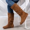 Effortlessly Chic Slouchy Boots in brown leather These stylish boots feature a slouchy fit and sleek design perfect for elevating any outfit