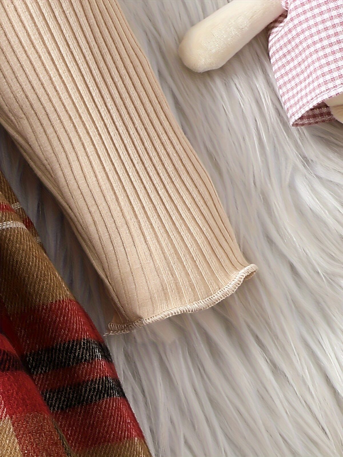 Adorable girl wearing a red and white plaid dress and matching beret Perfect for spring or fall