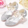 A pair of elegant Starlight Sparkle Girls Princess Heels perfect for weddings and special events The shoes feature sparkling embellishments and a delicate design