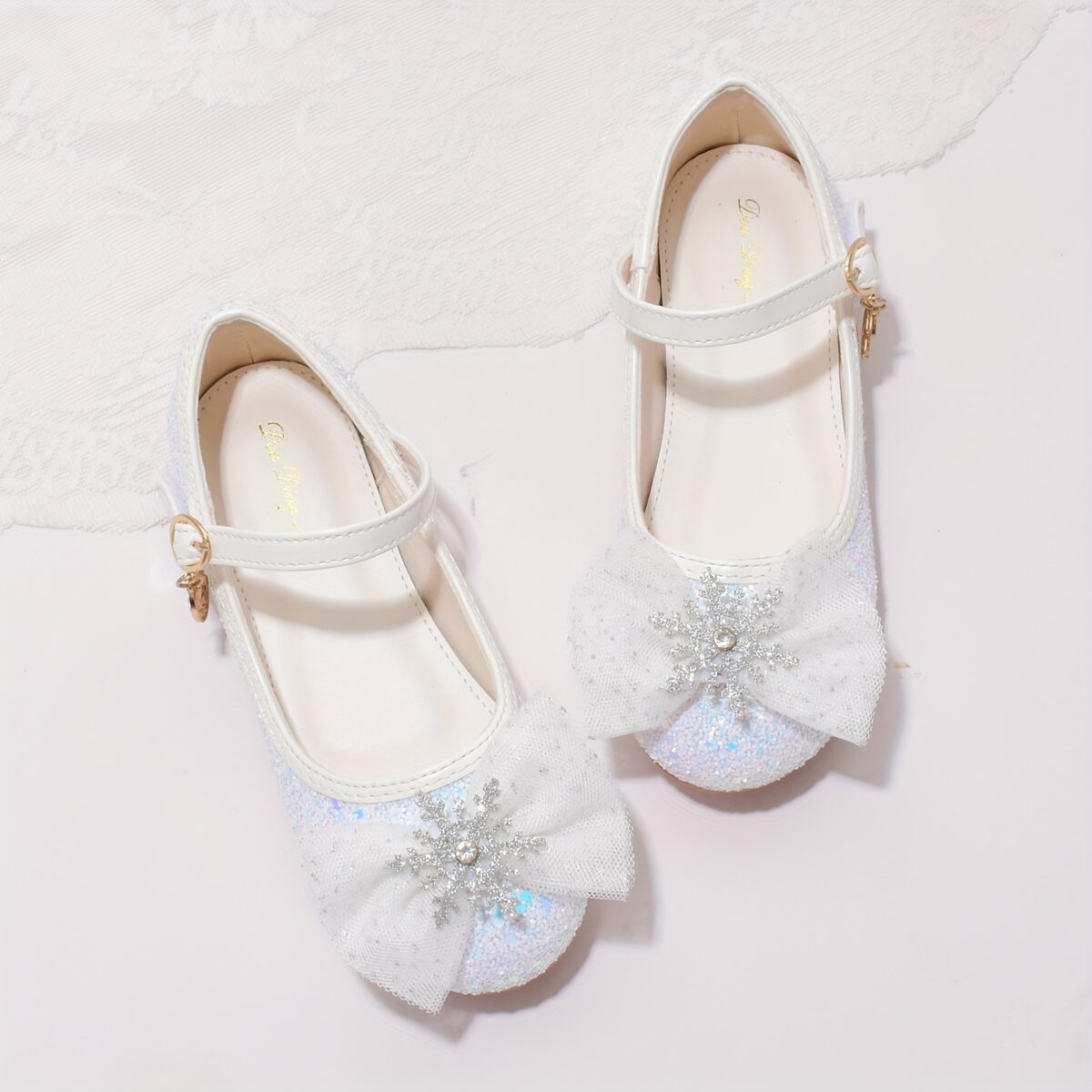 Enchanted Crystal Girls Blue Shoes by Newness Sparkling blue childrens shoes adorned with crystals perfect for special occasions or everyday wear