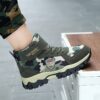 Stylish and durable Newness Explorer Kids Camo Boots perfect for outdoor adventures Showcasing their camouflage pattern and sturdy construction