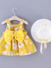 Baby girl wearing adorable Newness Sunny Days floral print dress