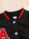 Stylish preppy varsity jacket and skirt set in navy and cream modeled on a student in a school setting