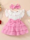 Adorable toddler girl in a vibrant Summer Bloom dress perfect for summer adventures The dress features a playful floral print and comfortable breathable fabric