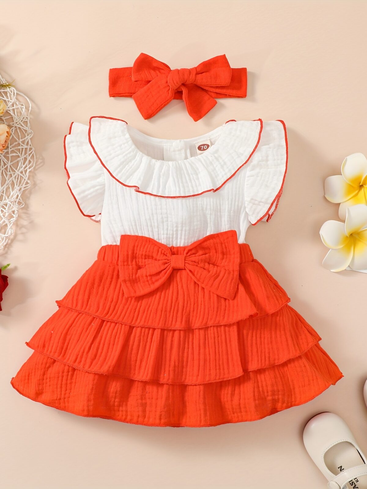 Adorable toddler girl in a vibrant Summer Bloom dress perfect for summer adventures The dress features a playful floral print and comfortable breathable fabric