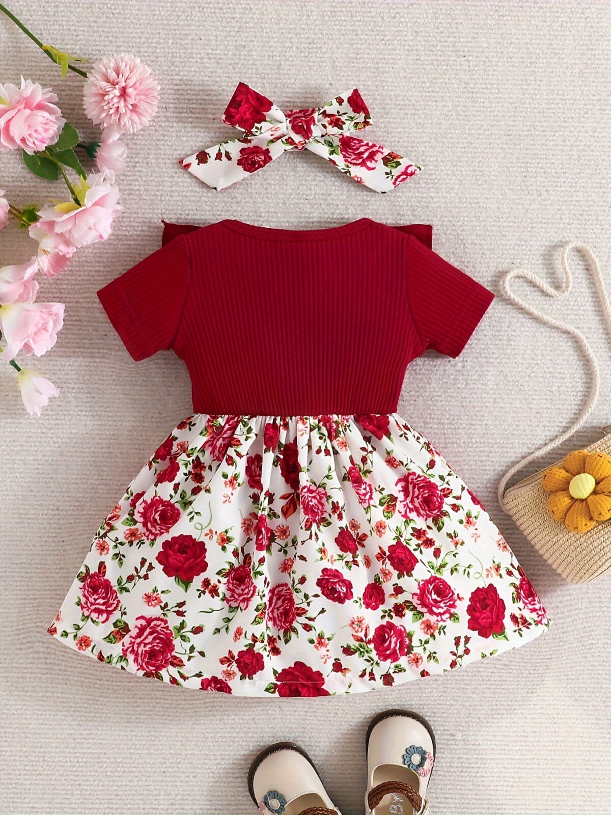 Adorable baby girl wearing a Summer Bloom floral dress perfect for summer