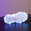 Kids GUANGLAN Nova Glow Shoes lighting up at night showcasing their lightweight and durable design Perfect for nighttime play and adventures