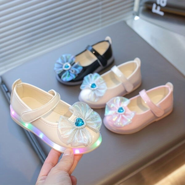 Girls stylish LED Glow Shoes from Newness in a fun and vibrant color The shoes light up are comfortable and perfect for parties