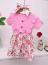 Adorable baby girl wearing a Summer Bloom floral dress perfect for summer