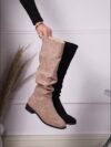 Newness Slouchy Suede Mid Calf Boots in rich brown suede leather showcasing the comfortable slouchy fit and mid calf height Perfect for adding a touch of effortless chic to any winter outfit