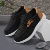 Stylish and comfortable blue canvas sneakers for boys perfect for playtime The shoes feature a classic design with durable construction