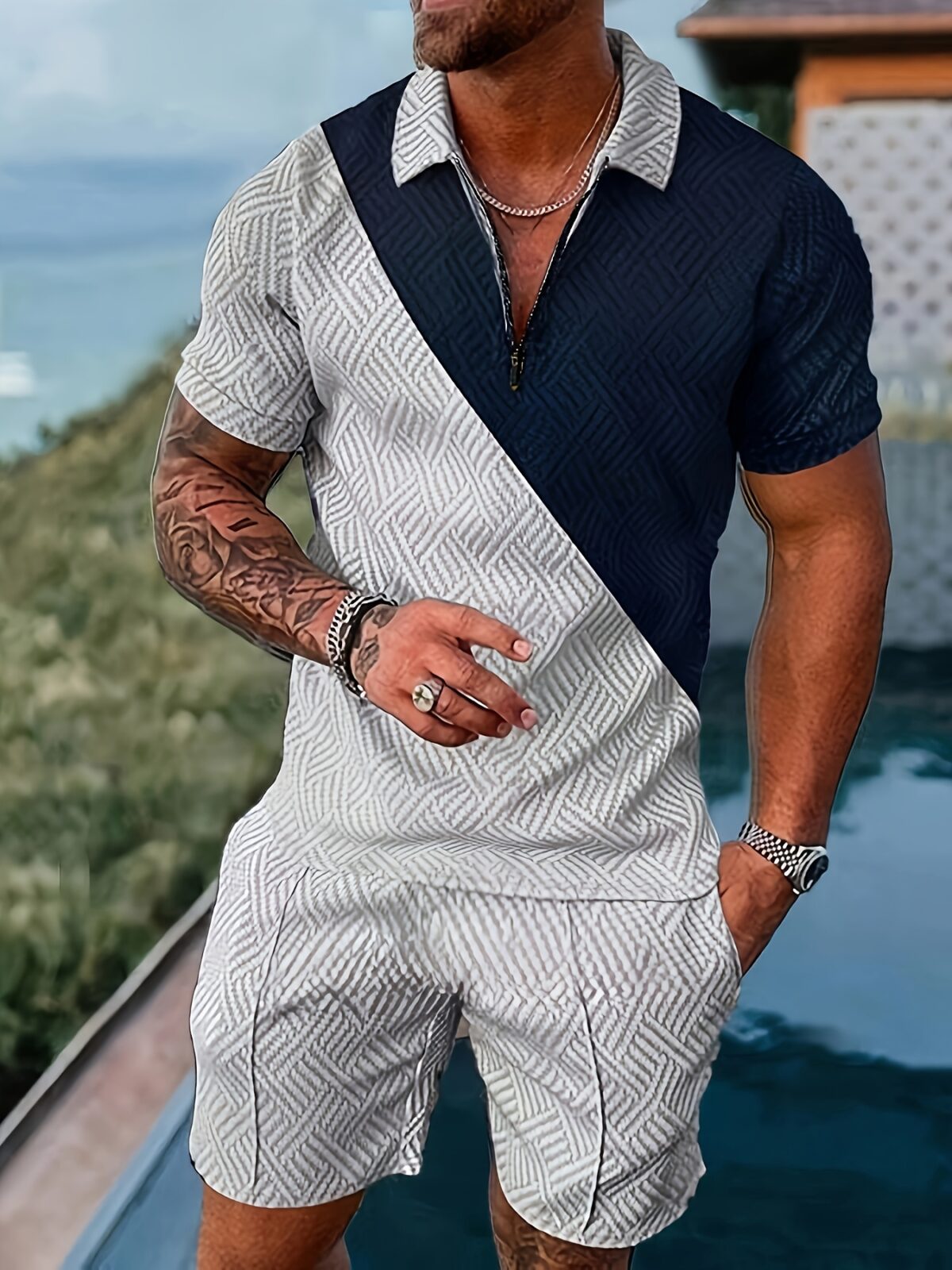 Monaco Riviera Geometric Print Suit by Newness A stylish two piece suit featuring a breathable polyester fabric and a modern geometric print perfect for summer