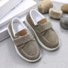 Stylish and comfortable blue canvas shoes for boys perfect for everyday wear The shoes feature a classic design with a touch of modern style