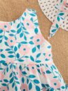 Adorable girl wearing a beautiful floral print summer dress perfect for a beach party