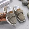 Stylish and comfortable blue canvas shoes for boys perfect for everyday wear The shoes feature a classic design with a touch of modern style