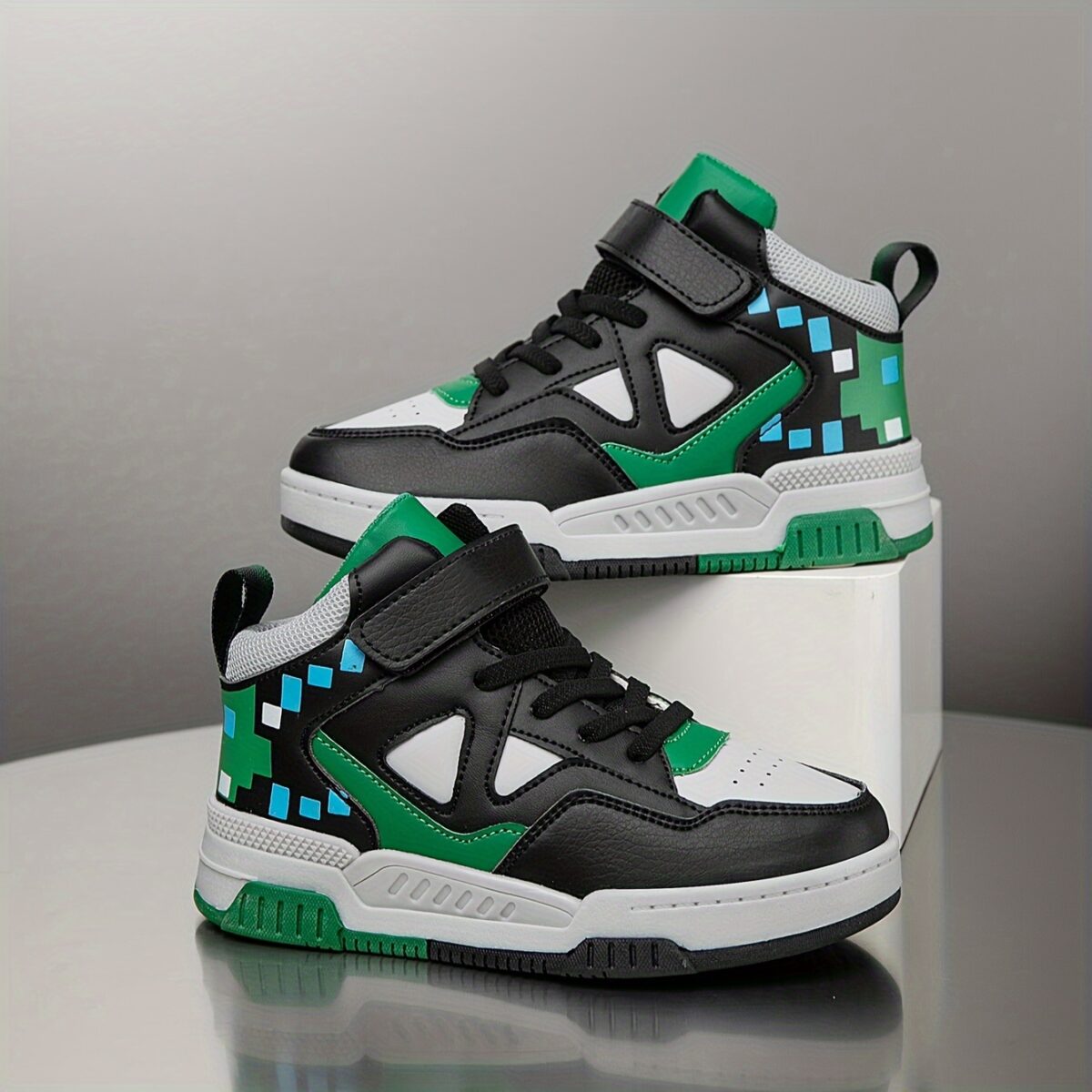 Stylish Retro Pixel Geometric Sneakers for kids by Newness These sneakers feature a vibrant geometric pixel design