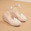 Newness Coastal Breeze Lace Up Wedge Sandals in white showcasing the intricate lace up detail and comfortable wedge heel perfect for summer