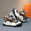 Stylish and comfortable Velocity Boys Sneakers in multiple colors perfect for any occasion Showcasing the sneakers design details and fit