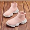 Stylish and comfortable Newness Cloudwalkers Kids High Tops in action perfect for active play A childs feet are shown wearing the high top sneakers while engaged in energetic activity
