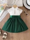 Adorable green midi dress perfect for summer styled on a girl