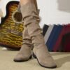 Newness Slouchy Suede Mid Calf Boots in rich brown suede leather showcasing the comfortable slouchy fit and mid calf height Perfect for adding a touch of effortless chic to any winter outfit