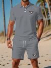 Newness Riviera Escape Mens Navy Polo Set A stylish navy polo shirt and shorts set perfect for summer The model is wearing the set looking relaxed and confident