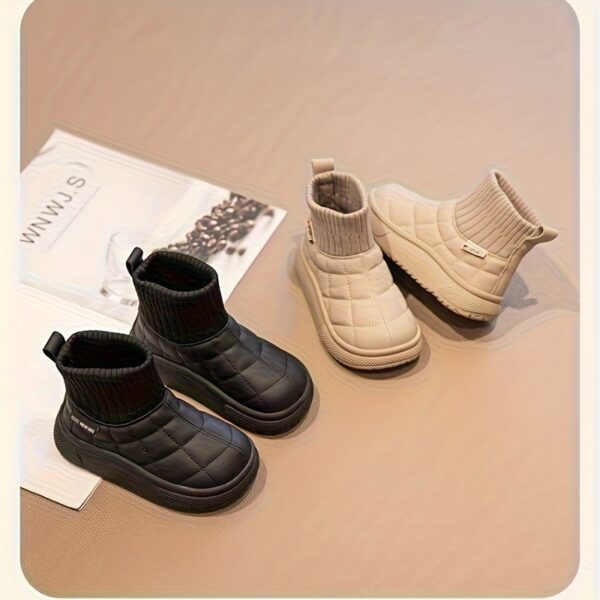 Stylish boys quilted boots from Newness perfect for fall and winter Featuring a quilted design and durable construction these boots offer both style and warmth