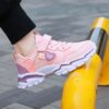 Newness Starlight Glow Running Shoes Trendy black and pink luminous running shoes showcasing comfort and style